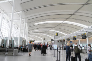 Toronto, Canada: Travelers walking through Terminal 1 of Toronto Pearson International Airport.